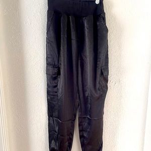 Satin jogger with pockets and side pockets on each leg.  Never worn